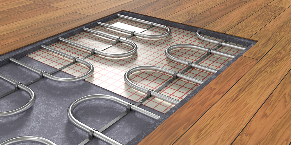 A radiant heat system is set up underneath a homeowner's wood floors.