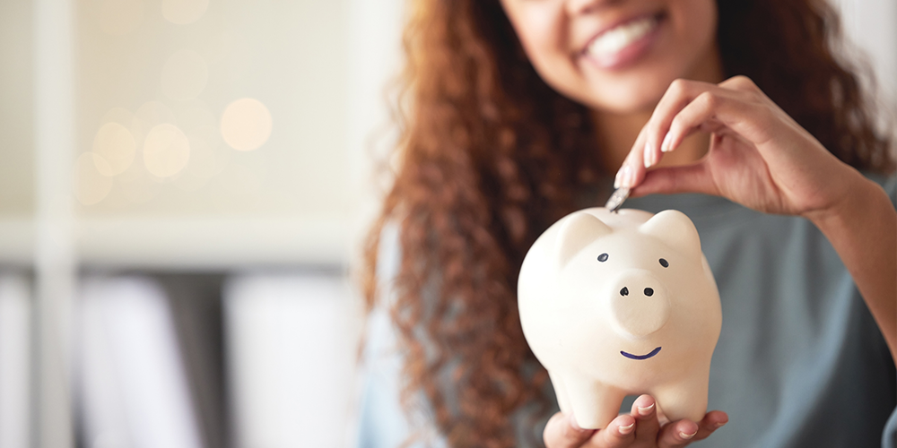 Homeowner budgets using piggy bank after learning how to stay cool in summer.